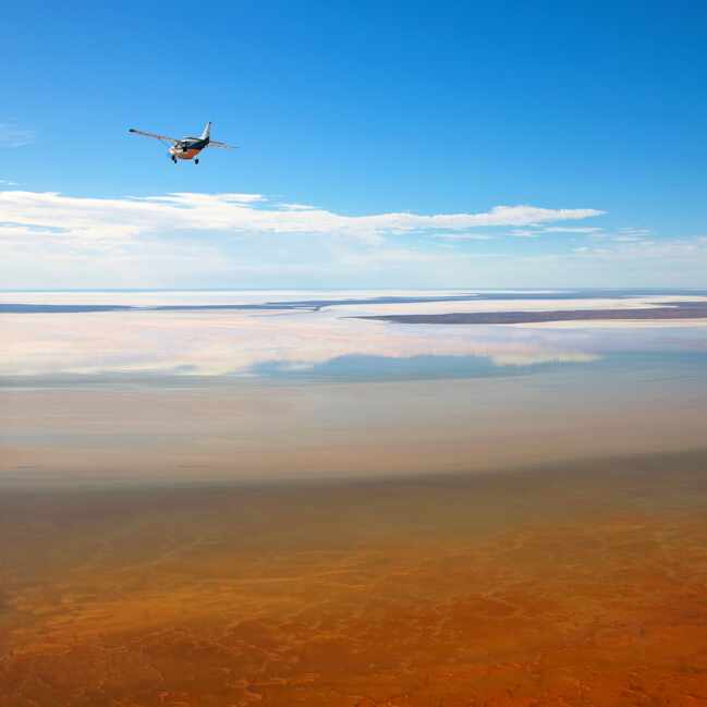 Plane flying over Lake Eyre, South Australia